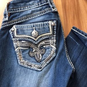 Size 25 Skinny, 31 length inseam.